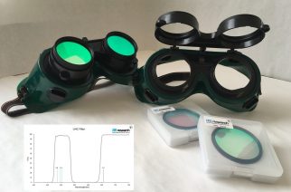 Observing Goggles with Pair of 2-inch Filters. Towards the right shows the goggles and the filters still in their packages, while on the left shows the filters installed. Note the filters can flip up and out of the way.